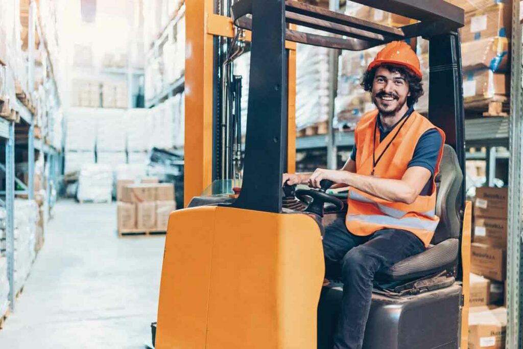 Forklift driver in a warehouse